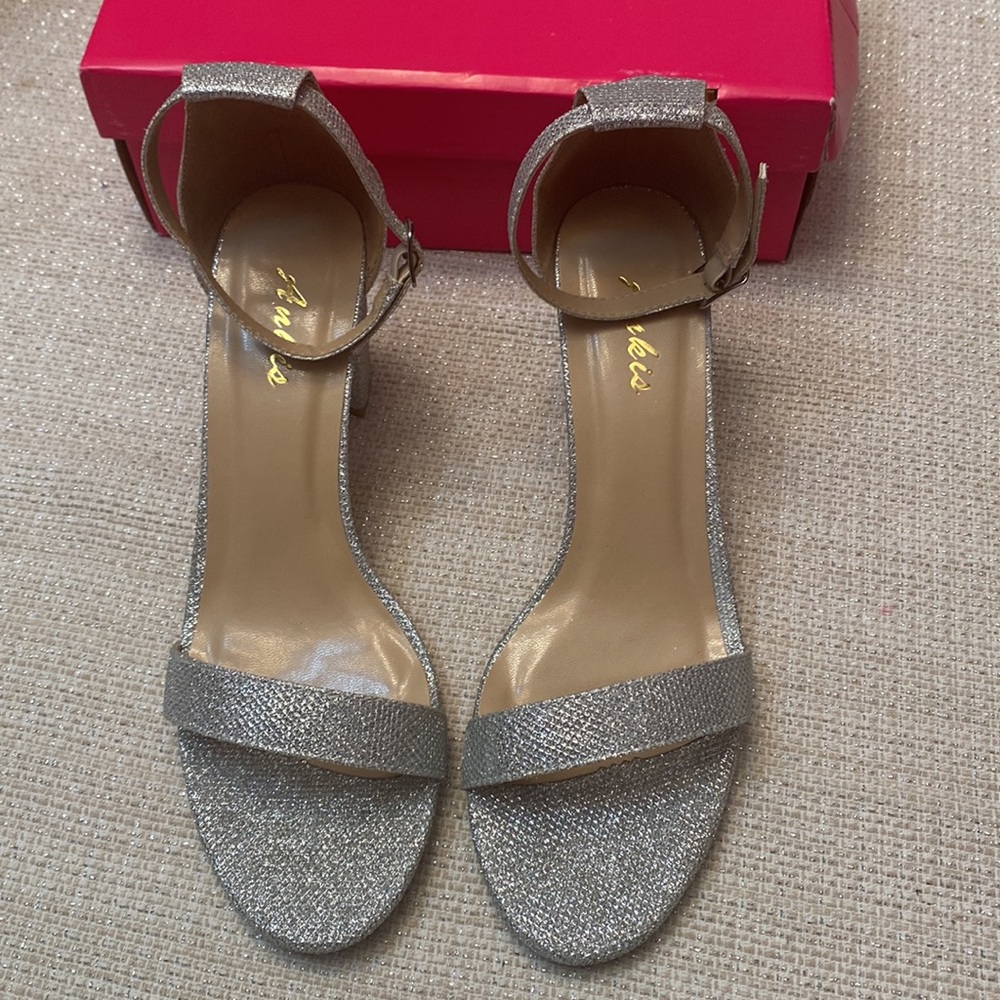 Silver sparkle heels with open toe, ankle strap and chunky heel shoes by Ankis